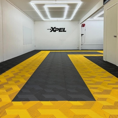 Carreaux de plancher imperméables à l'eau pour garages et ateliers